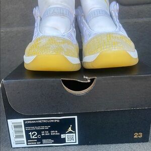 Jordan 11 Retro Low PS in Yellow and White